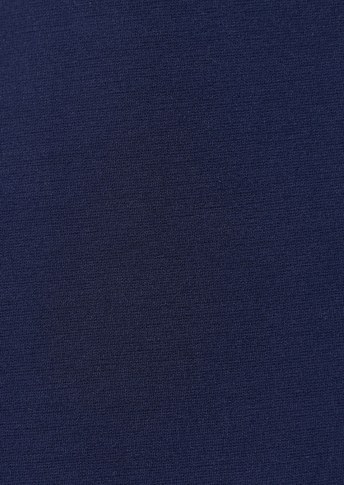Zoom sur la matière du blazer bleu marine en jersey de chez Humiliy.